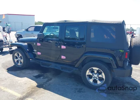 2015 Jeep Wrangler Unlimited Freedom Edition z USA, uszkodzony, nr VIN 1C4BJWDG8FL573414